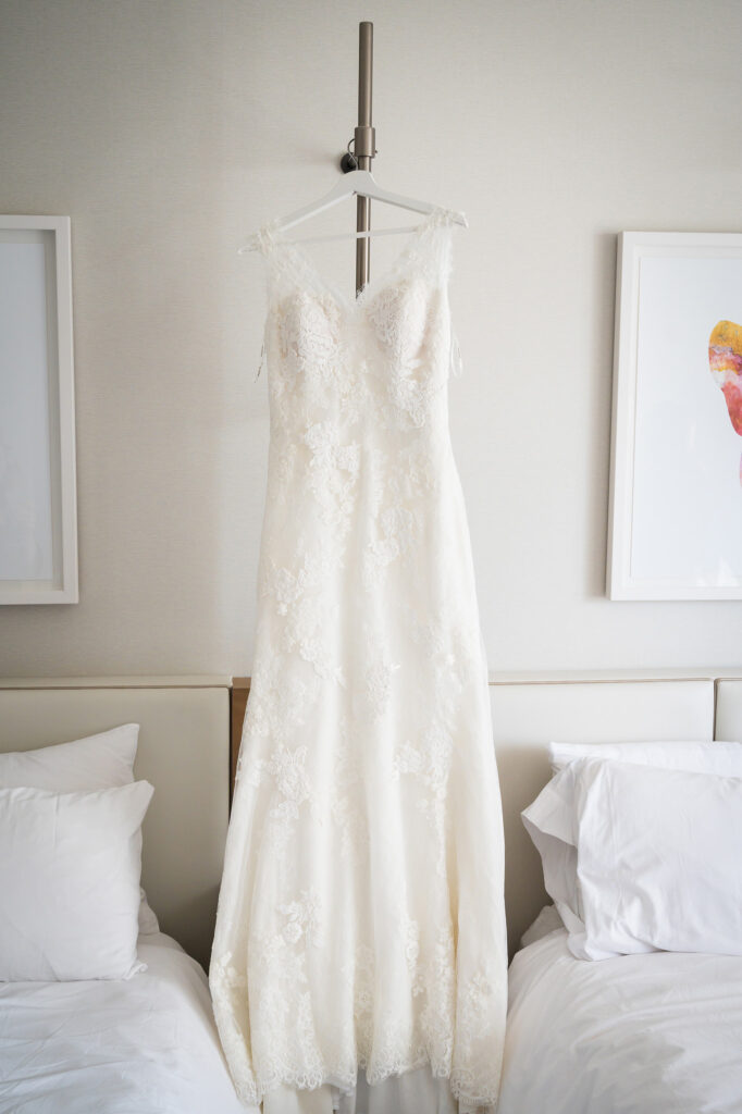 Kristy 's wedding dress hangs at the JW Marriot Park hotel.